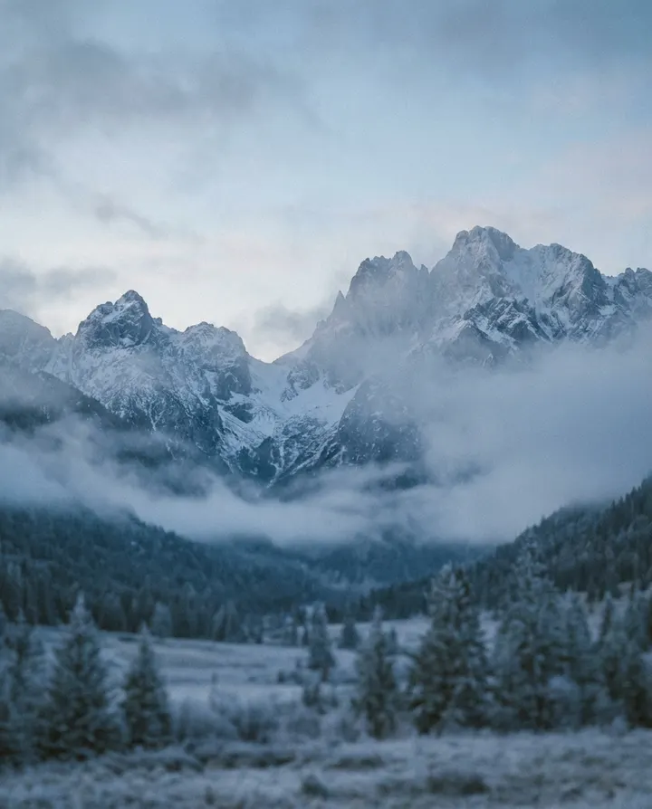 Misty mountains at dawn, a frame from a documentary-style faceless video